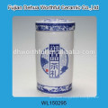 Elegant ceramic tea canister with blue and white